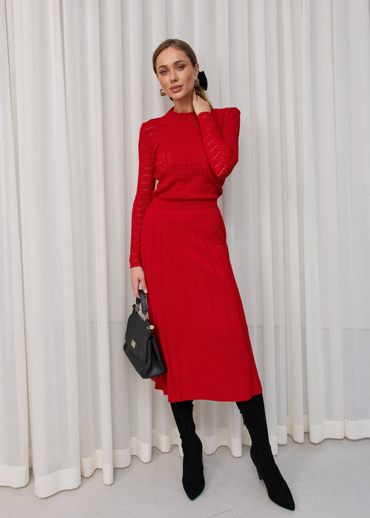 В’язана сукня міді з ажурним візерунком