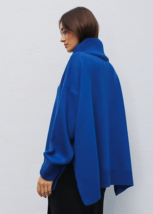 Об’ємний светр з високим коміром