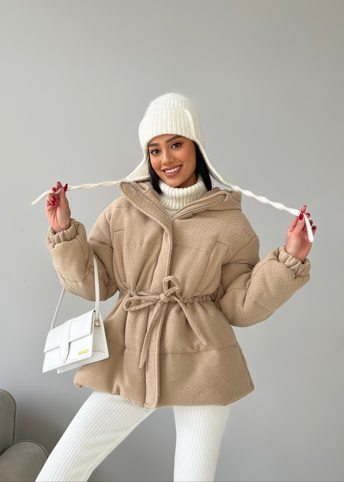 Зимова куртка з кулискою на талії