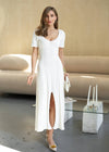 Трикотажна сукня з рельєфними лініями та розрізом