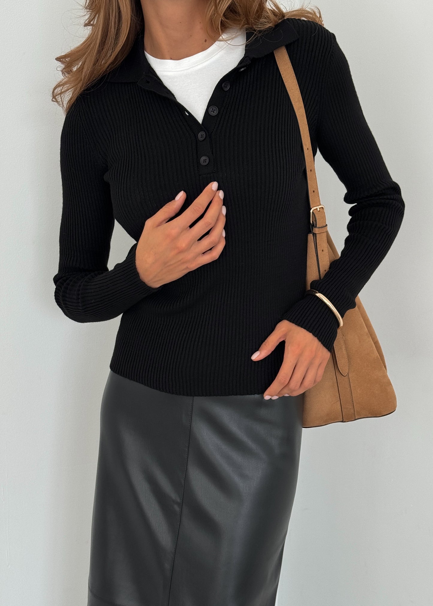 Спідниця міді з екошкіри